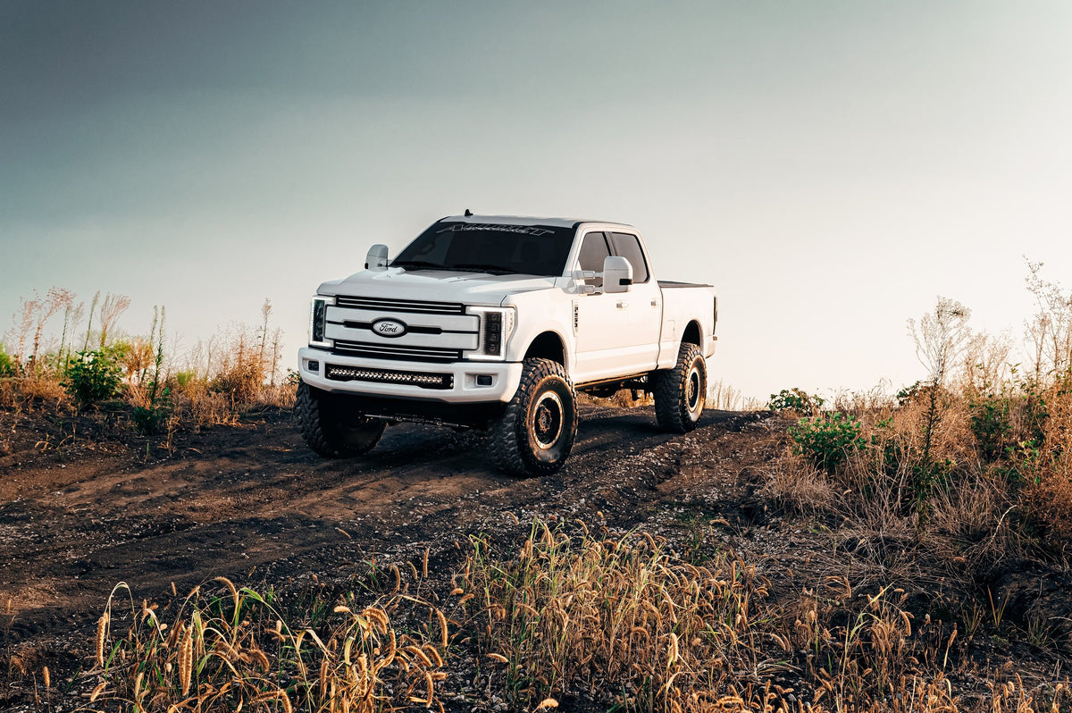 Black Rhino Abrams Gloss Gun Black Machined Dark Tint on a Ford F250