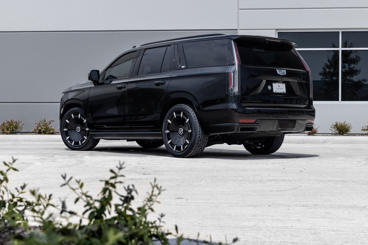 DUB DC271 Cheef Gloss Black Milled on a Cadillac Escalade