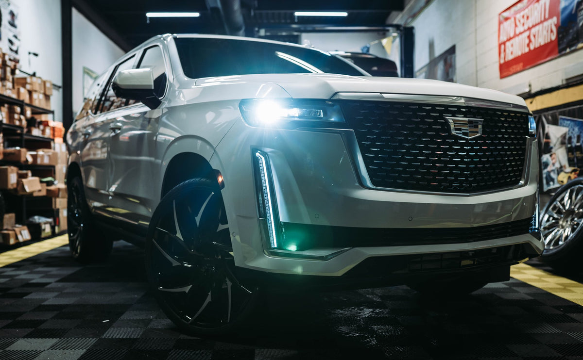 DUB S259 G.O.A.T. Gloss Black with Machined Spokes on a Cadillac Escalade