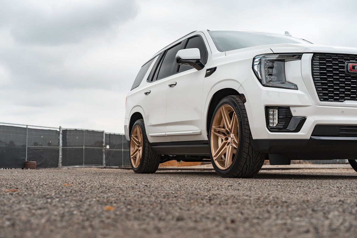 DUB S266 Dirty Dog Platinum Bronze on a GMC Yukon
