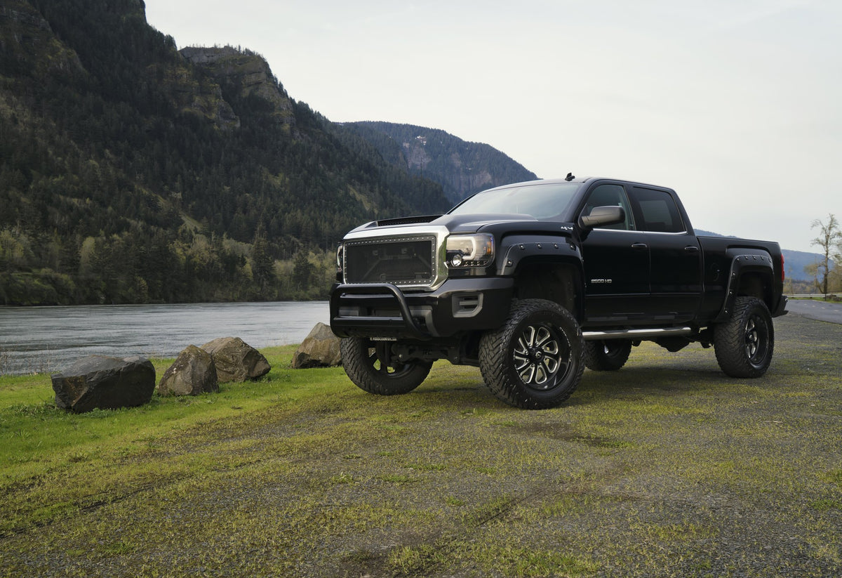Fuel Off-Road D587 Flow Gloss Black Milled on a Chevy 2500HD