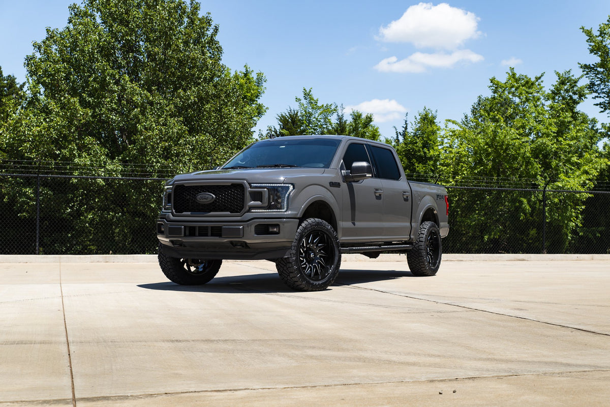 Fuel Off-Road D744 Saber Gloss Black Milled on a Ford F150