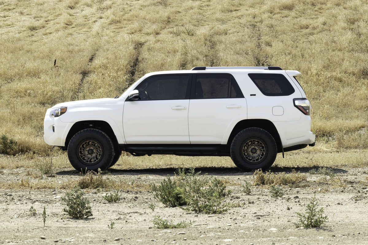 Fuel Off-Road D841 Runner OR Bronze with Black Ring on a 2019 Toyota 4Runner
