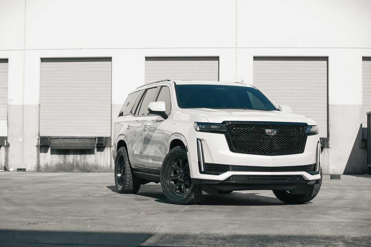 Fuel Off-Road Darkstar Matte Black with Gloss Black Lip on a Cadillac Escalade
