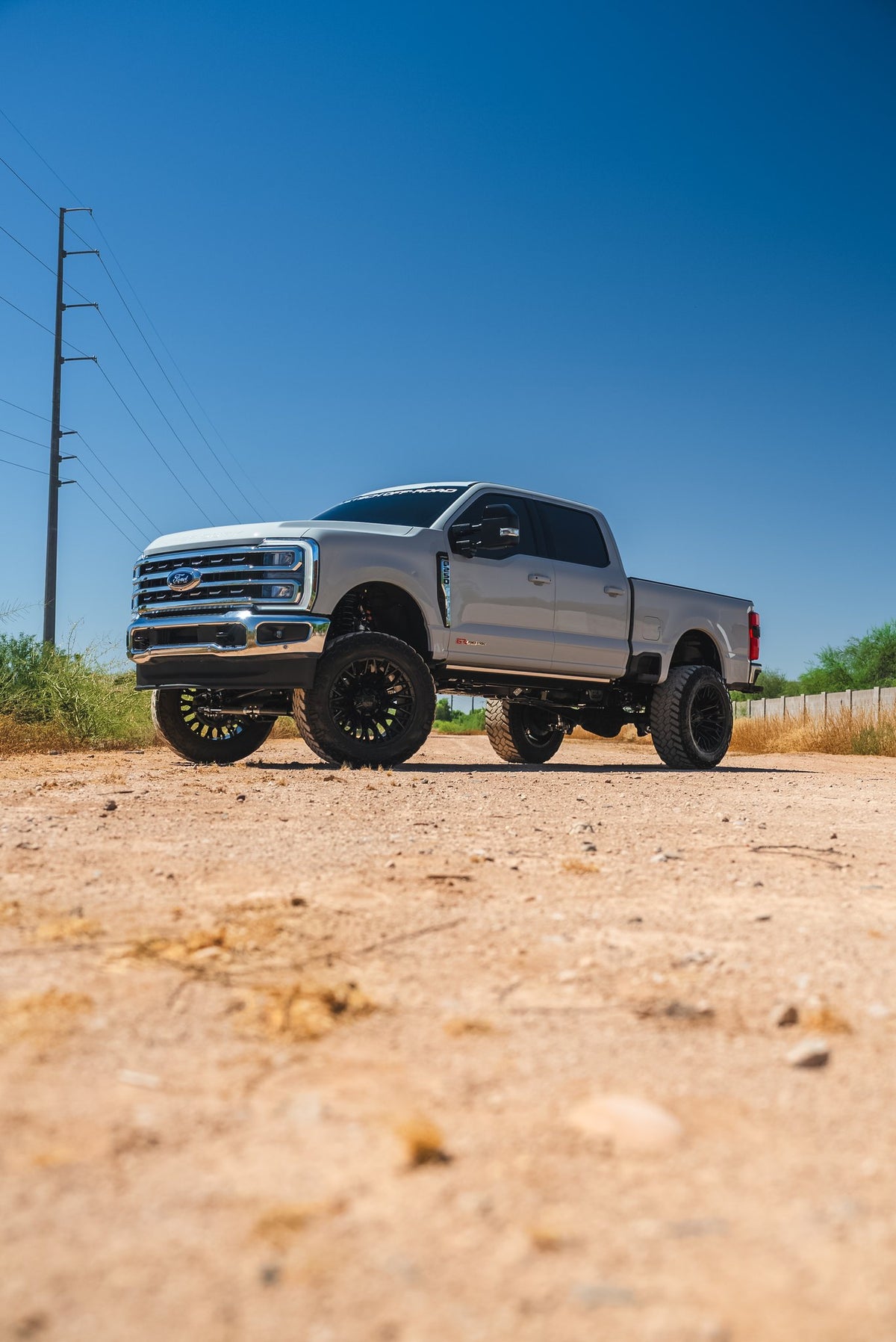Fuel Off-Road FC865 Strike Gloss Black on a Ford F250