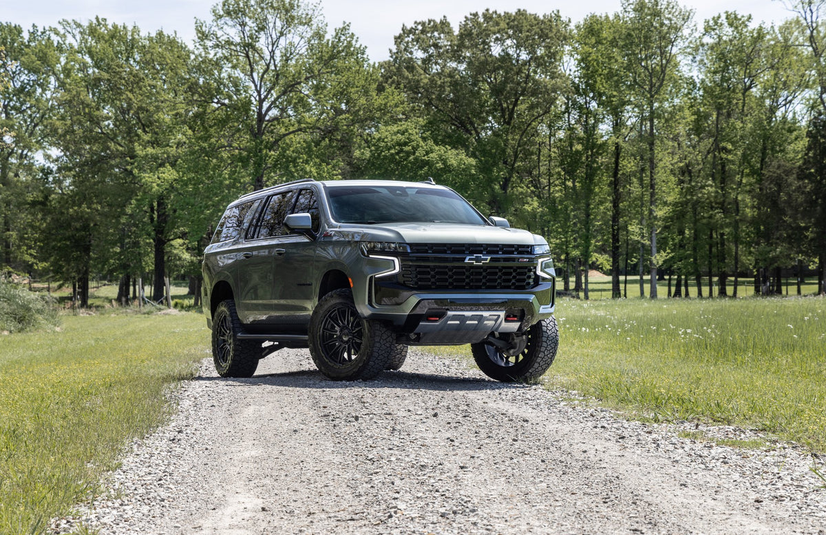 Fuel Off-Road FC866 Piston Blackout with Gloss Black Lip on a Chevrolet Suburban