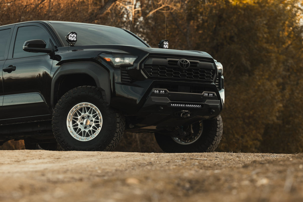 KMC KM555 Attack Gloss Silver with Machined Face on a 2025 Toyota Tacoma