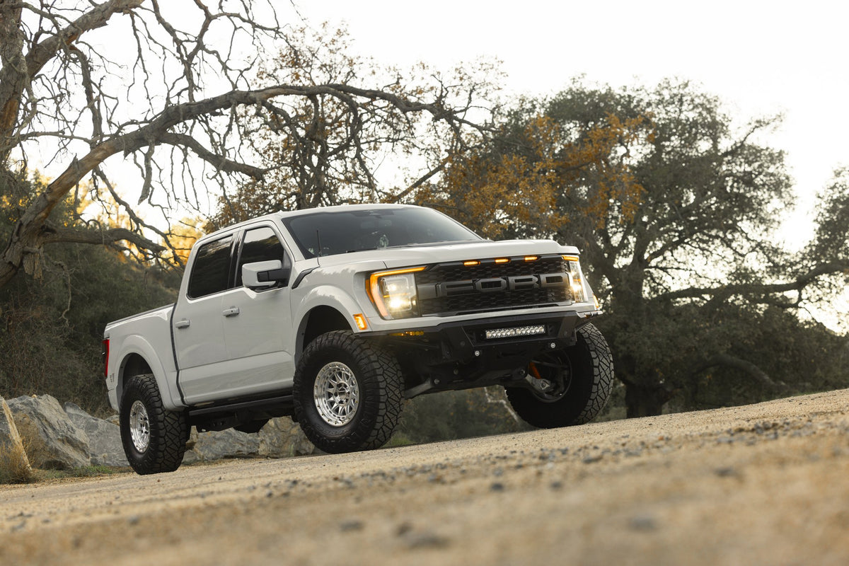 KMC KM556 Crux Gloss Silver with Machined Face on a Ford F150 Raptor