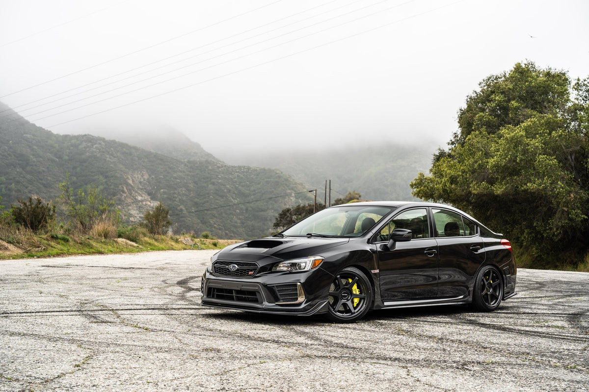 Motegi MR160 Battle VI Matte Blackbird Metallic on a Subaru WRX STI