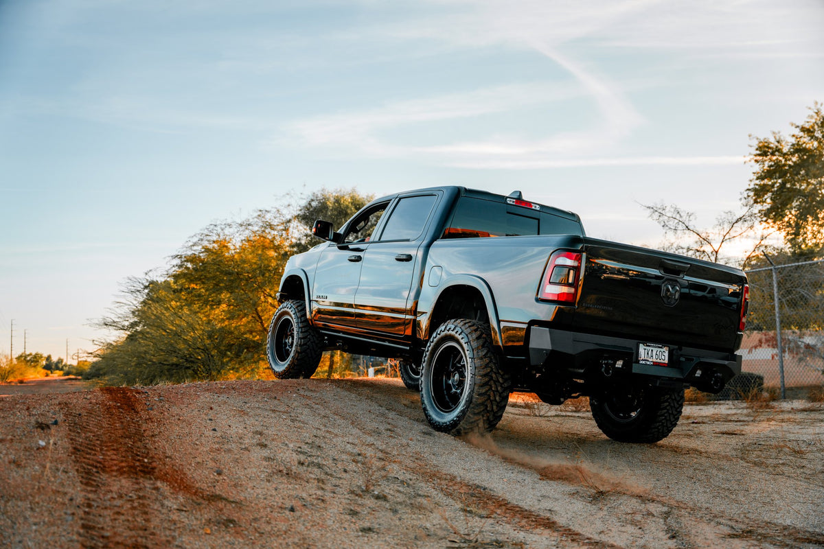 Moto Metal MO812 Turbine Gloss Black on a Dodge RAM Bighorn