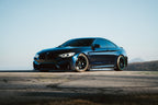 Rotiform RC208 BPU Gloss Black with Teal Stripe on a 2019 BMW M4
